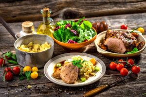 A table with different types of food on it.