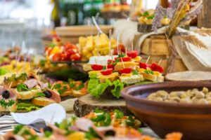Colorful appetizer buffet with assorted canapés